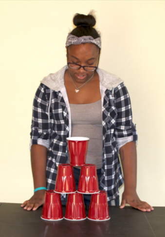 Engineer Sylvana Azana introduces a cup tower engineering challenge